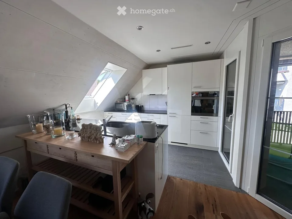 Appartement 3.5 pièces avec balcon et place de parking en garage
