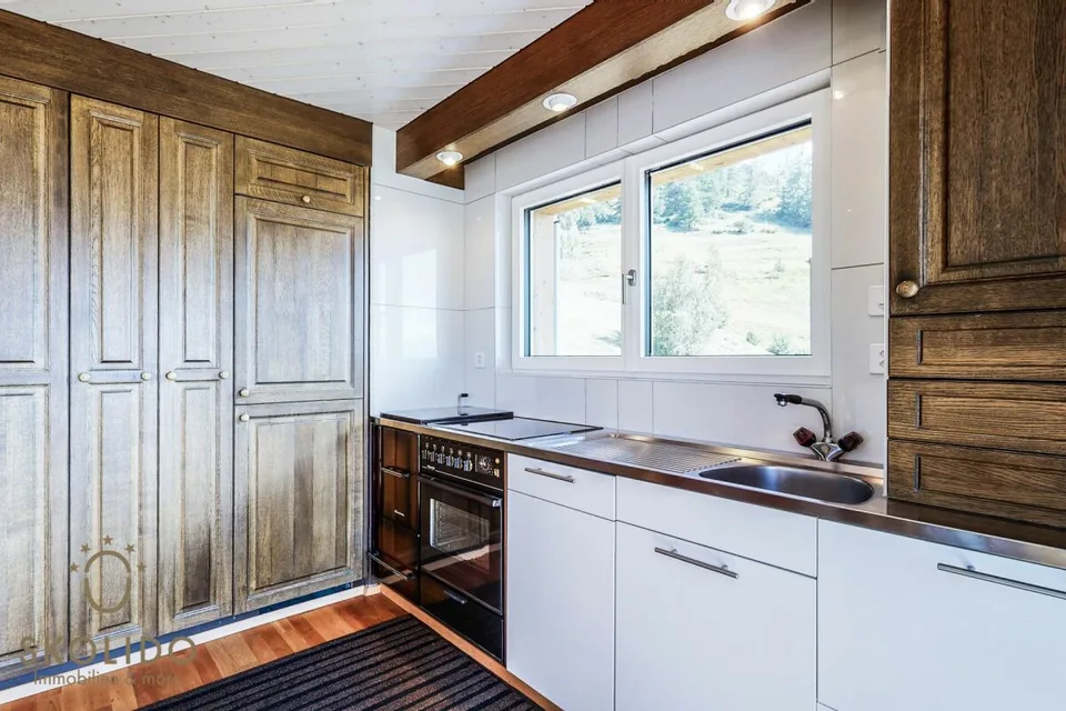 Gepflegtes und modernisiertes Chalet mit Einliegerwohnung und Traumausblick – Foto 12 von 30