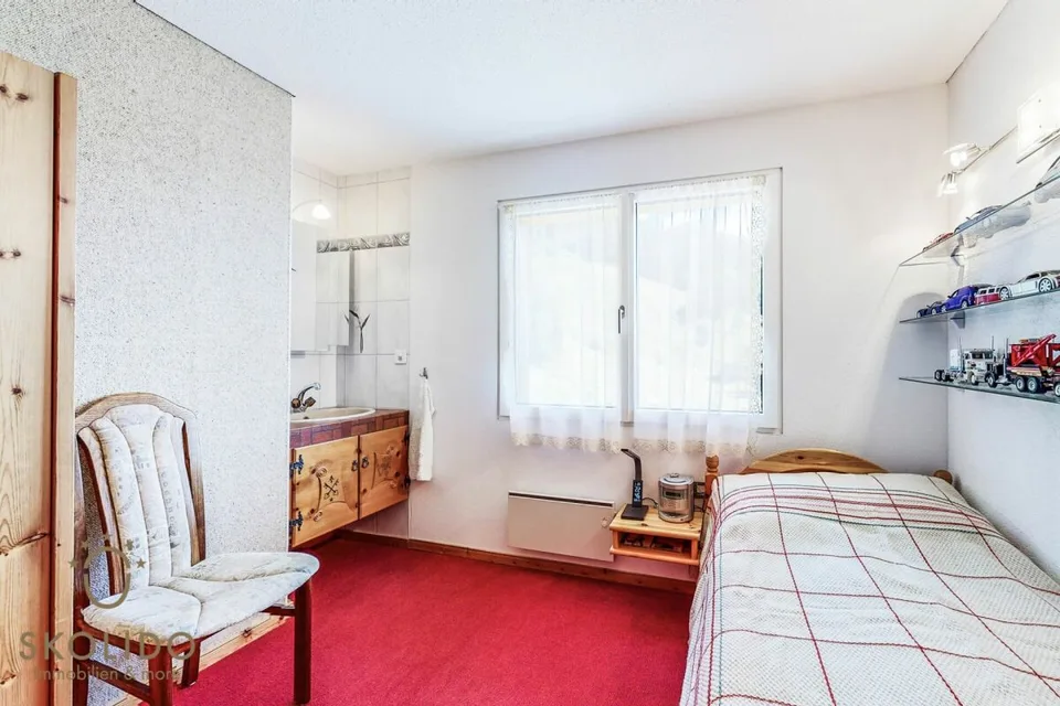 Gepflegtes und modernisiertes Chalet mit Einliegerwohnung und Traumausblick – Foto 19 von 30