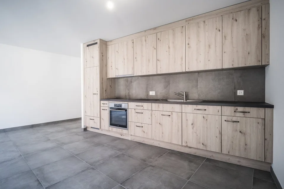 Wohnung mit 2.5 Zimmern in Wohngebäude
