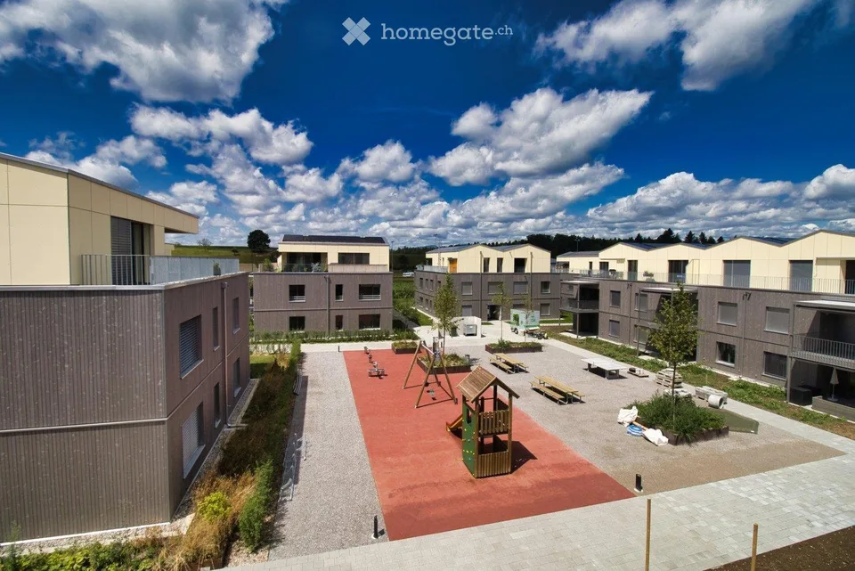 Moderne Neubauwohnung mit Garten im Dorfzentrum
