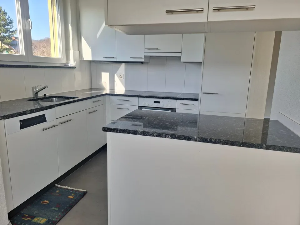 Appartamento di 4,5 locali con balcone in zona tranquilla