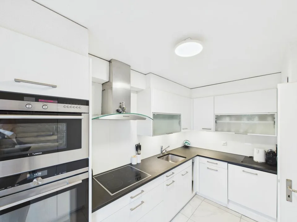 Maison mitoyenne de 6,5 pièces avec jardin et carport double
