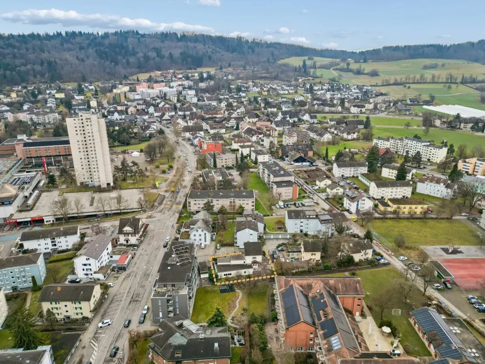 Maison de 3 familles attrayante sans trafic de passage à Regensdorf