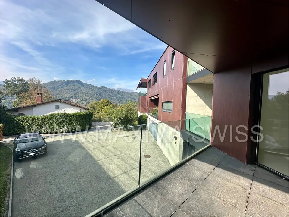 LUGANO-DAVESCO: 3.5 LOCALI DESIGN CON SPA E GROTTINO