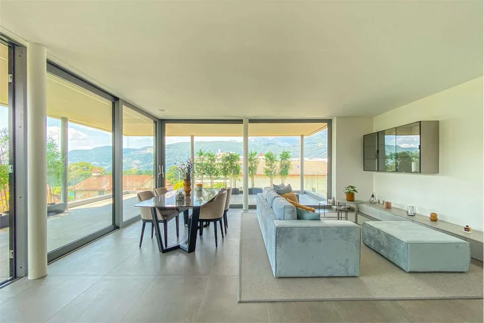 Comano: moderno 3.5 loc. di pregio con ampia terrazza