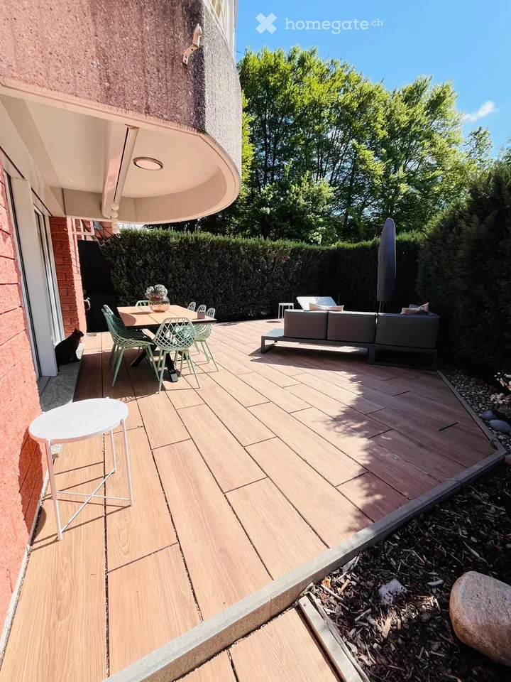 Maison unifamiliale à Porza avec jardin, 3 chambres et garage double avec recharge électrique