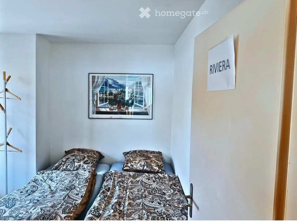 Camera in una casa condivisa confortevole, calma, con vista sul lago, tra Vevey e Losanna
