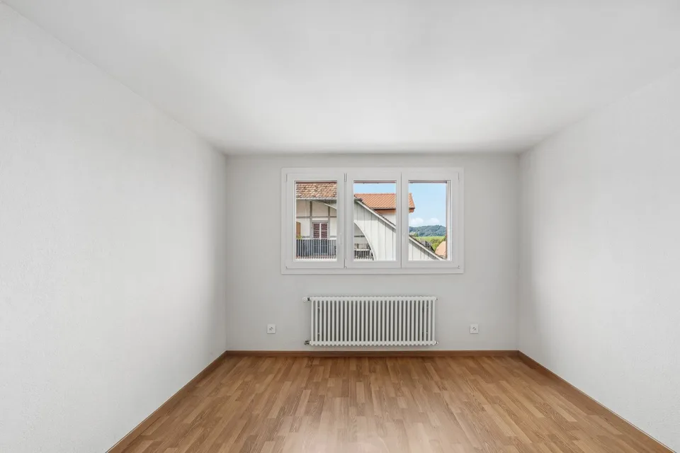 Ampio appartamento mansardato in una zona residenziale tranquilla!