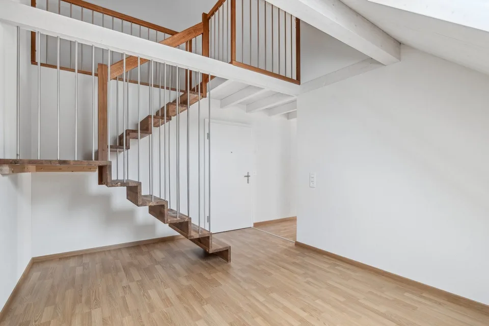 Ampio appartamento mansardato in una zona residenziale tranquilla!