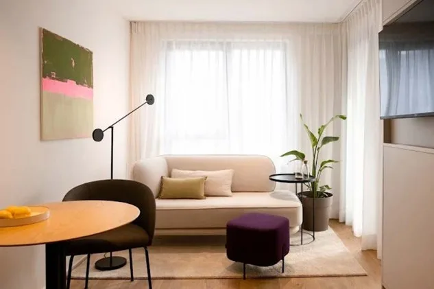 Appartement moderne de 1,5 pièces meublé avec vue panoramique à CHF 1'250/mois + forfait de services obligatoires