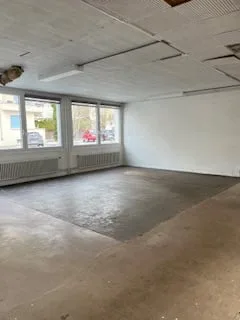 Espace commercial et atelier au rez-de-chaussée au Locle