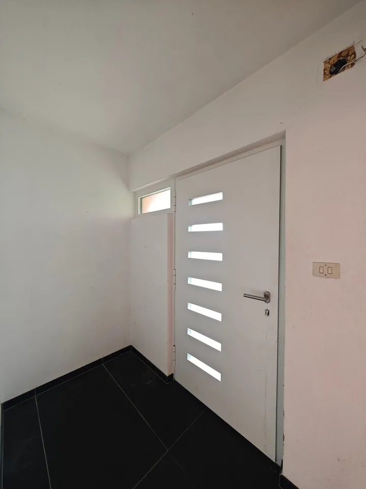 Casa a schiera con grande potenziale, terrazza, giardino e garage