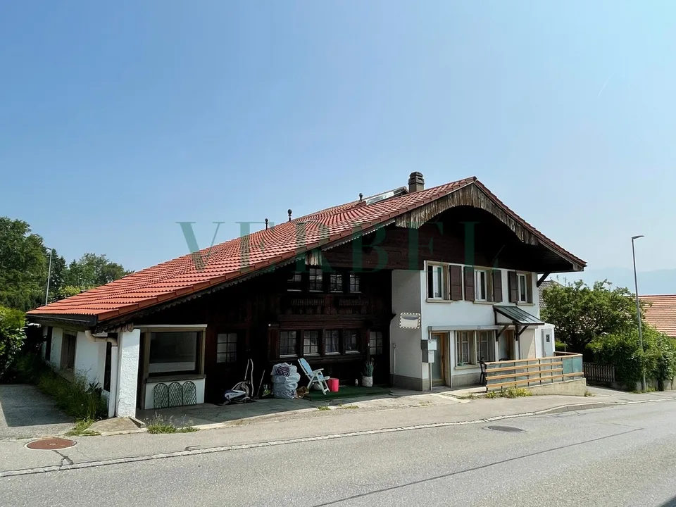 Grande maison avec potentiel d'aménagement