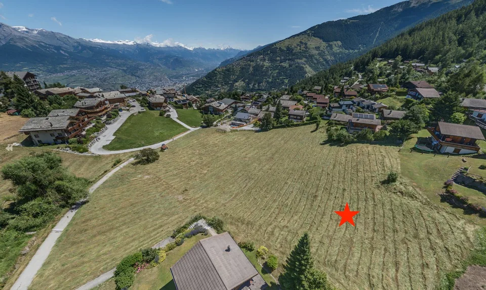 Grand terrain viabilisé dans un quartier résidentiel très proche du centre de la station
