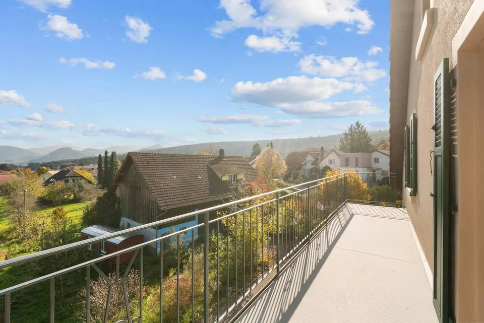 Multi-story attic apartment with balcony and fantastic views!