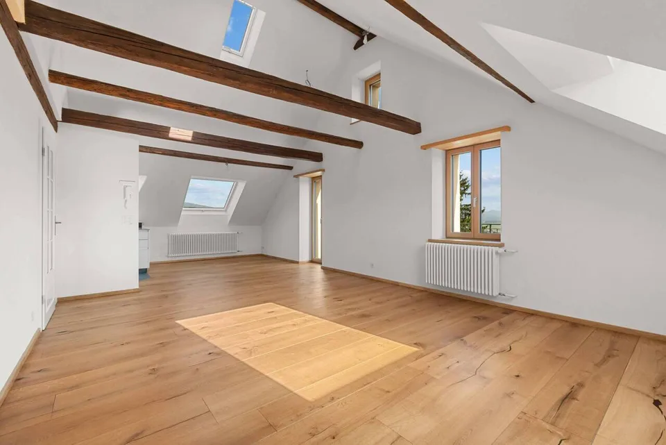 Multi-story attic apartment with balcony and fantastic views!