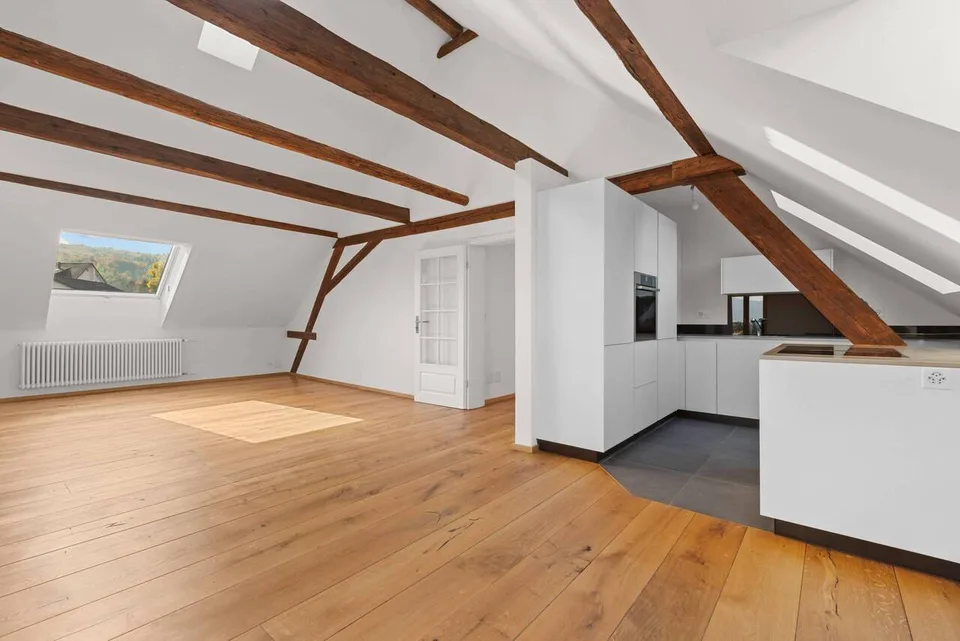 Multi-story attic apartment with balcony and fantastic views!