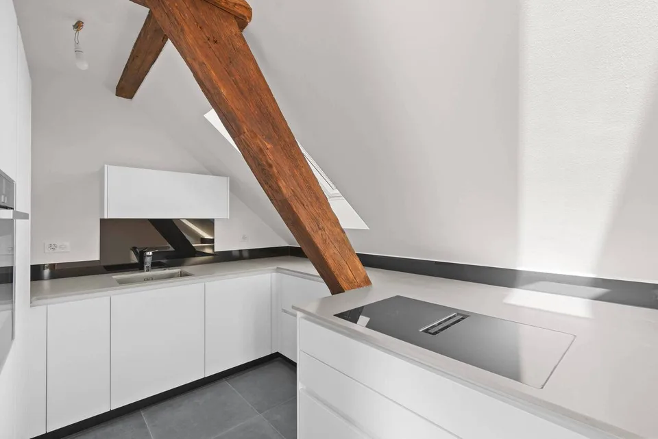 Multi-story attic apartment with balcony and fantastic views!