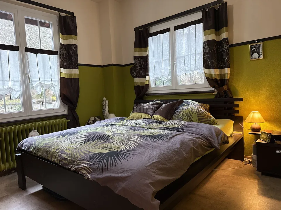 Casa incantevole con due appartamenti e giardino