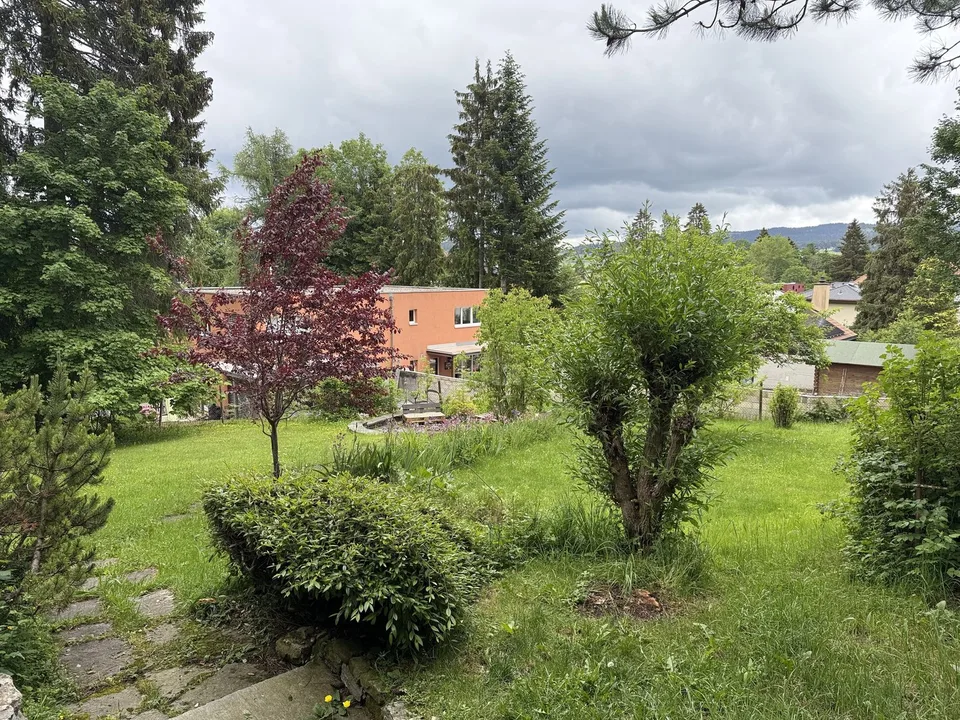 Casa incantevole con due appartamenti e giardino