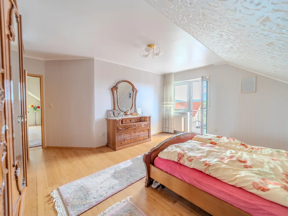 Spacious single-family house with separate apartment in Pfohren – photo 7 of 13