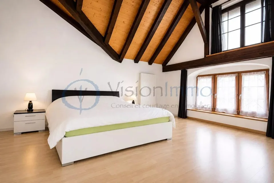 Duplex di carattere con mezzanino e volume cattedrale