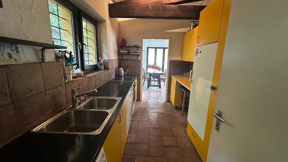 Casa Unifamiliare con vista lago e terreno edificabile