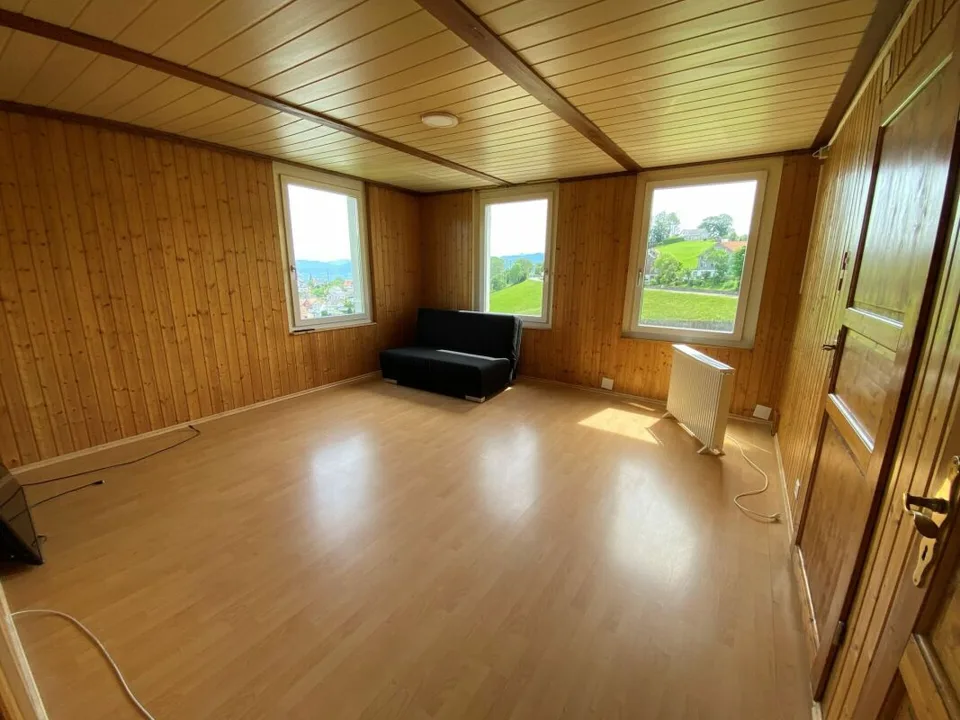 Espace de vie confortable avec vue sur le lac