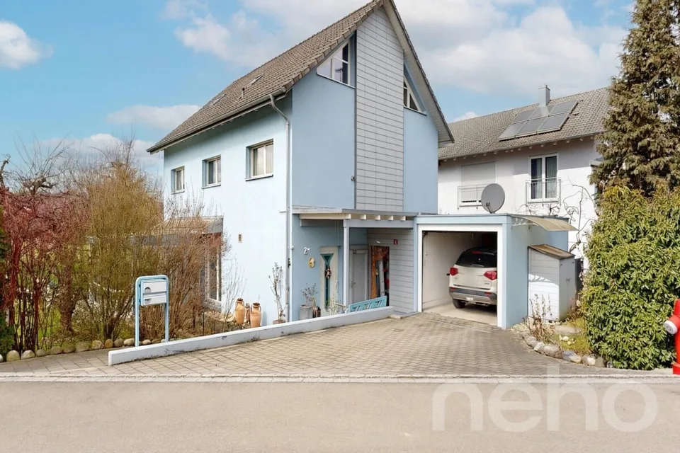 Freistehendes Einfamilienhaus mit sonnigem Garten und Wintergarten – Foto 17 von 18