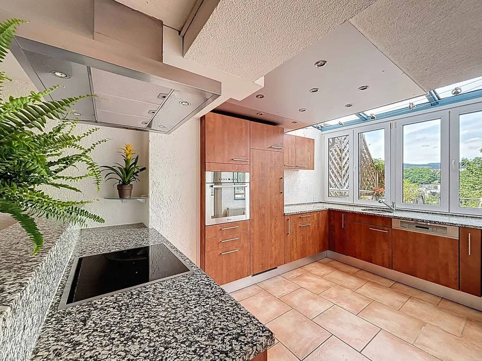 Dreieinhalb-Zimmer-Triplex mit Terrassen und eigenem Studio