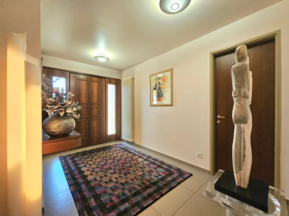 Mendrisio: Délicieuse maison unifamiliale contiguë avec splendide jardin et vue panoramique
