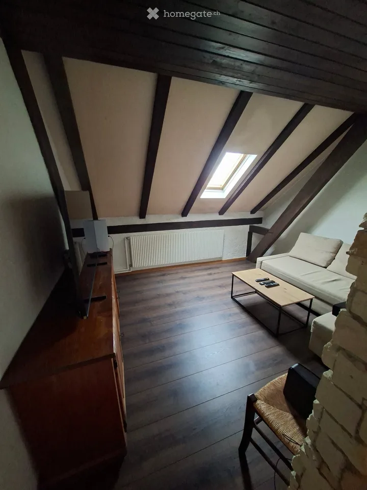 Charmant appartement mansardé de 3 pièces à louer à Le Noirmont avec premier loyer offert