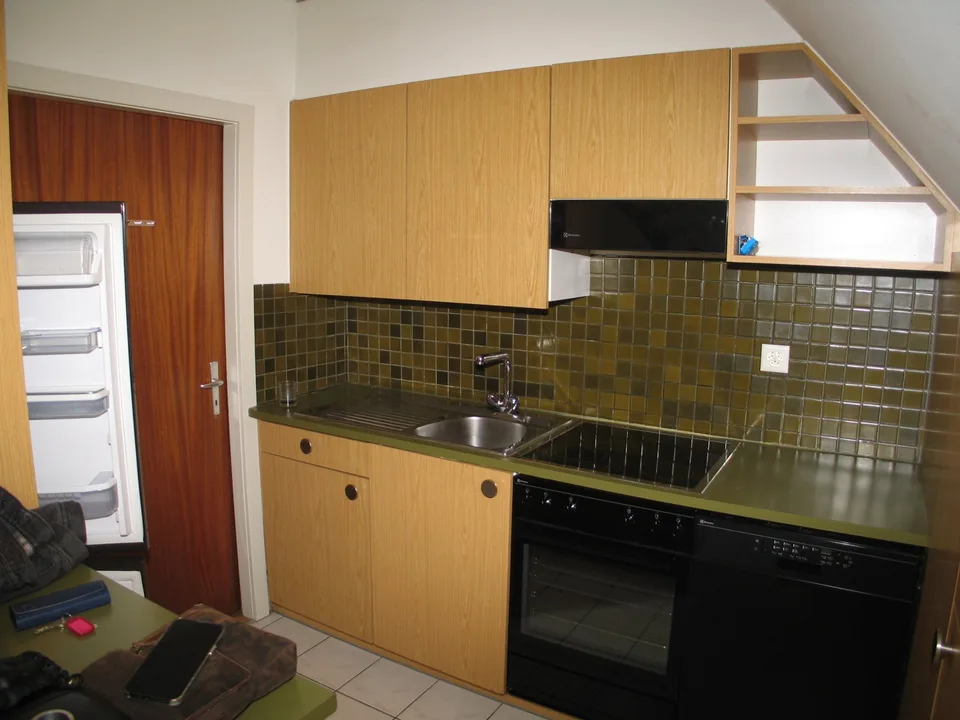 Charmant appartement de 3 pièces en mansarde avec galerie au centre de Riehen