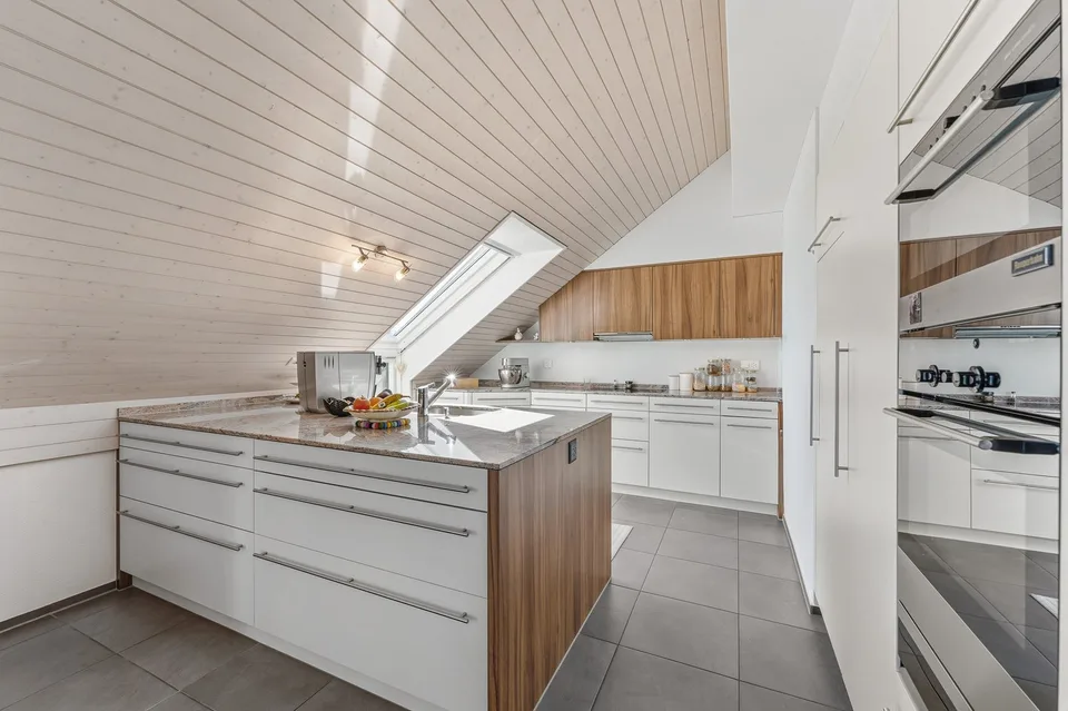 Appartement-maisonnette lumineux 4.5 pièces avec balcon spacieux