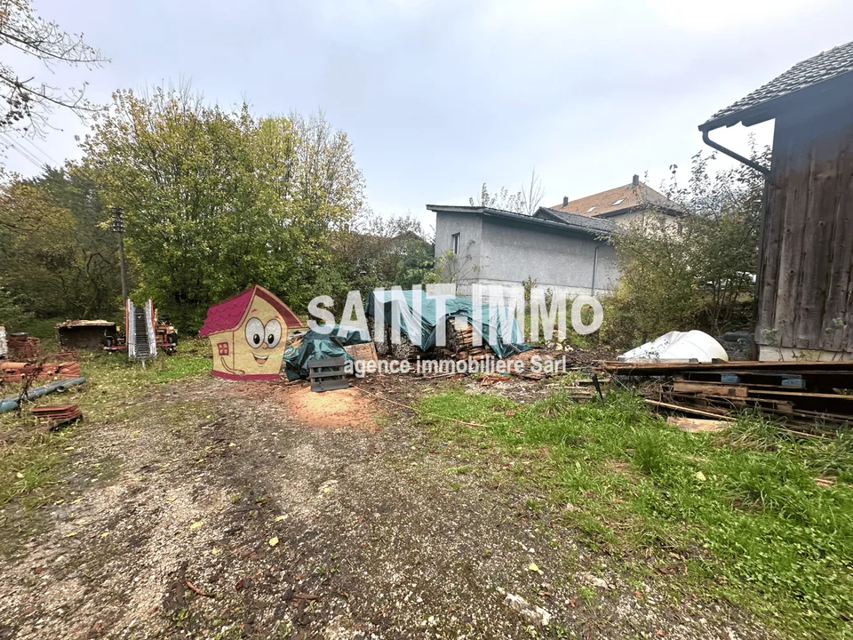 Building plot of 1’679 m2 with outbuildings in Malleray