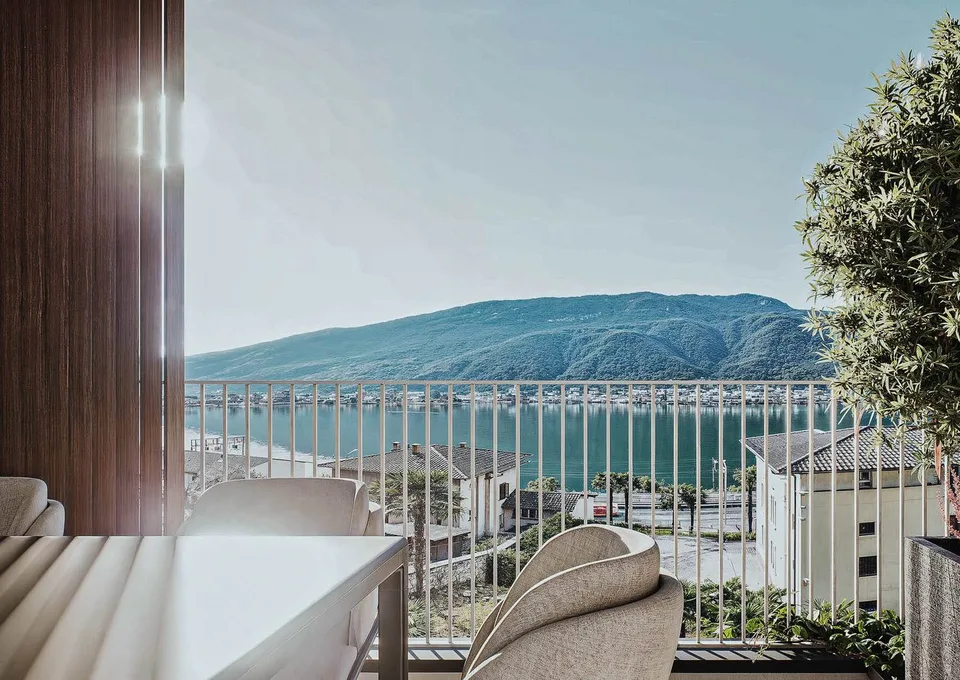 Appartamento vista lago con giardino a Capolago