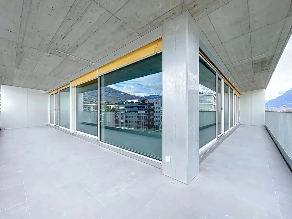 Bright attic with large balcony