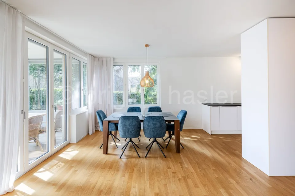 Appartement en propriété de 5 pièces avec part de jardin en situation calme et verdoyante