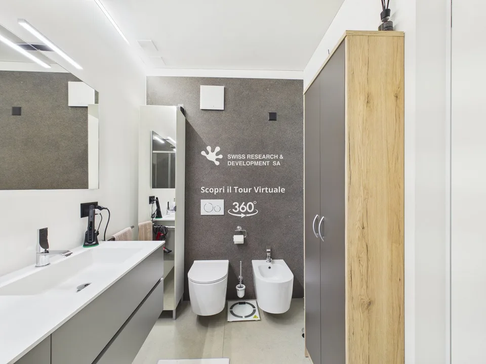 CONTEMPORANEO APPARTAMENTO DI 3,5 LOCALI CON AMPIA TERRAZZA E DOMOTICA INTEGRATA – Foto 15 von 26