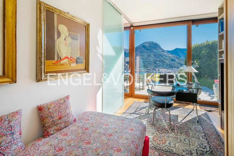 Prestigioso appartamento con giardino e vista lago – foto 10 di 13