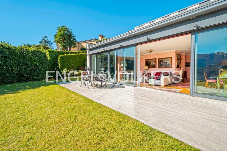 Prestigioso appartamento con giardino e vista lago – foto 13 di 13