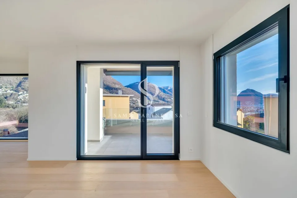 Attico con vista lago