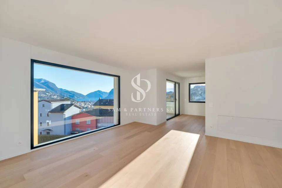 Attico con vista lago