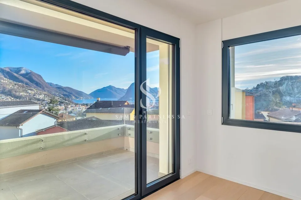 Attico con vista lago