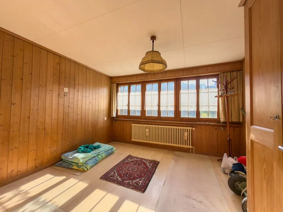 Chalet affascinante con grande potenziale su un grande terreno
