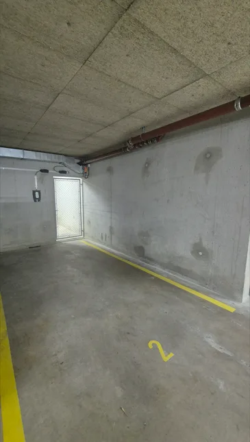 Parkplatz in einem Untergrundparkhaus in Eysins zu vermieten