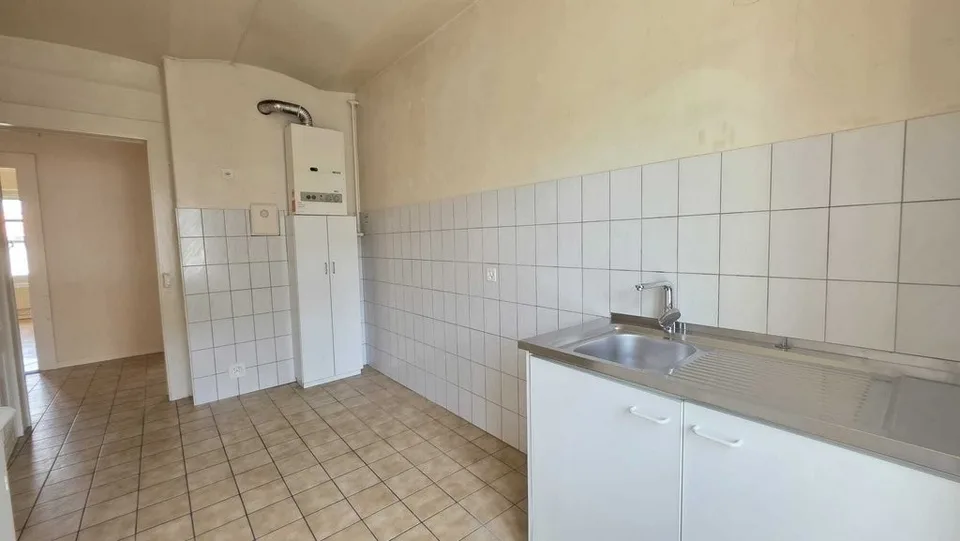 APPARTEMENT 3 PIECES AVEC BALCON PROCHE DES COMMODITES