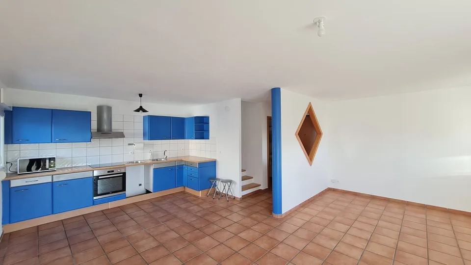 Triplex avec jardin