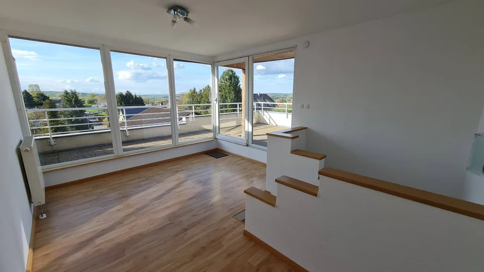 Triplex avec jardin
